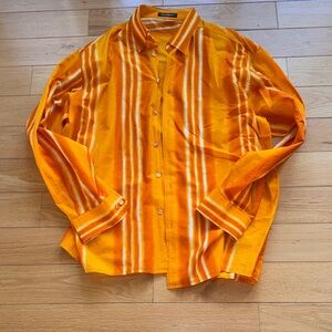 Yashi Yamamuri Orange Shirt